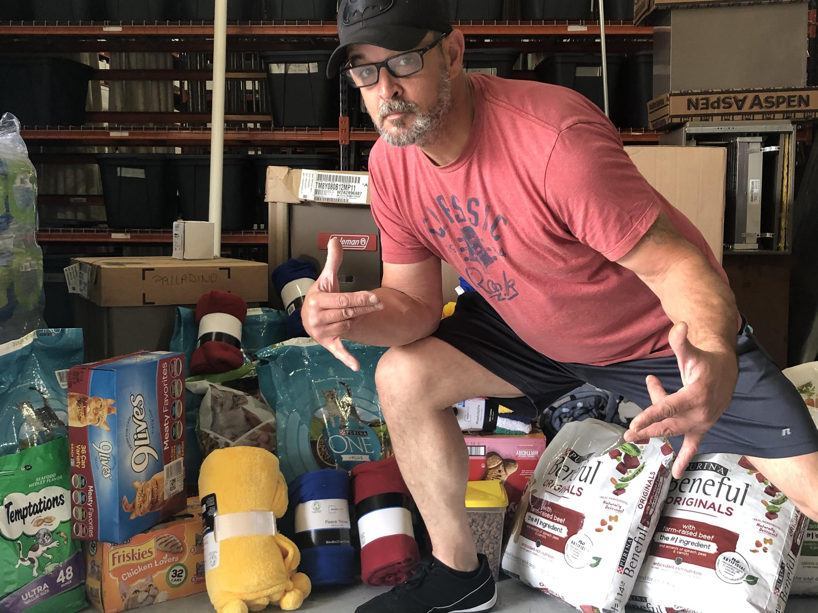 Craig with the supplies in the whare house