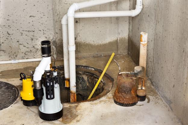 A well with pipes in the floor