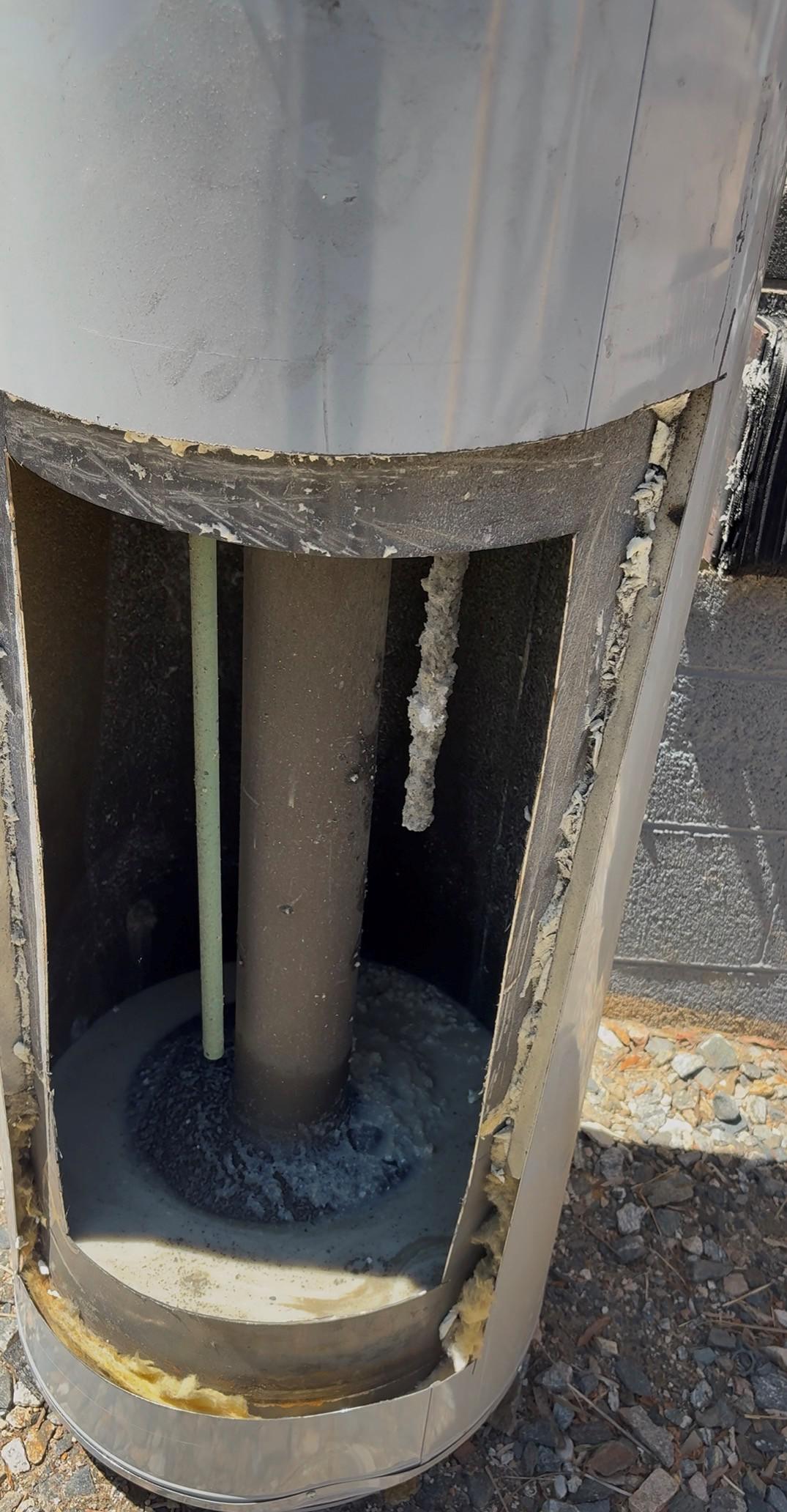 Why is my water heater making popping or banging noises?