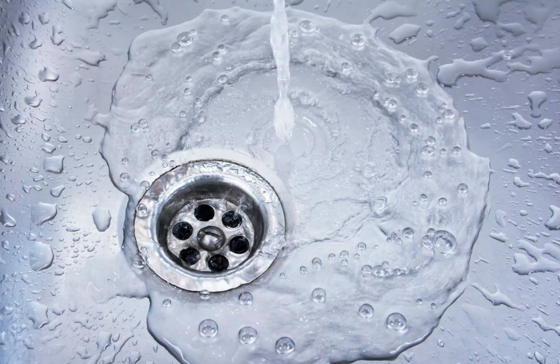 running water going down drain