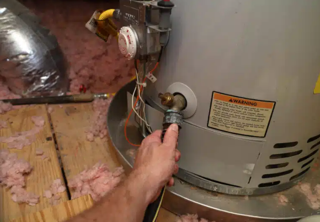 hose attached to water heater