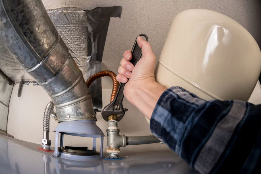 wrench around pipe for plumbing