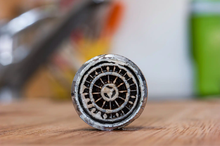 close up of dirty faucet filter