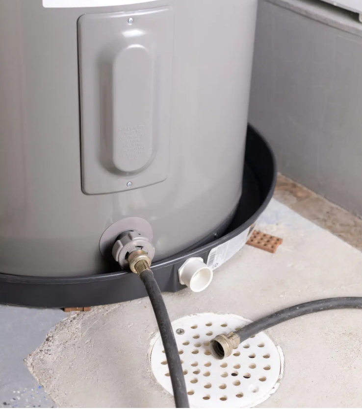 water heater draining into drain