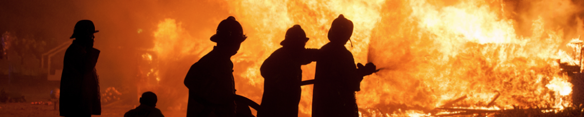 firefighters extinguishing flame