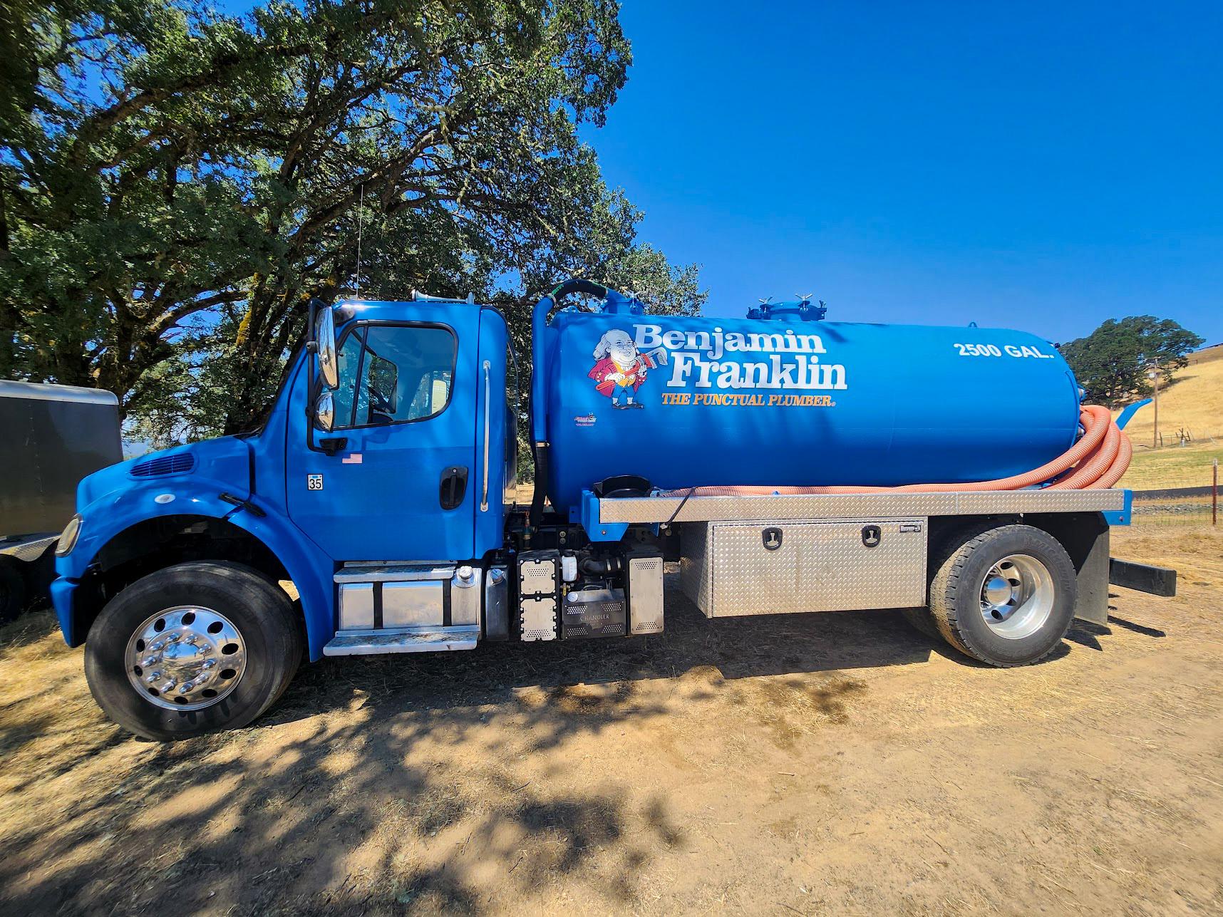 Blue septic truck
