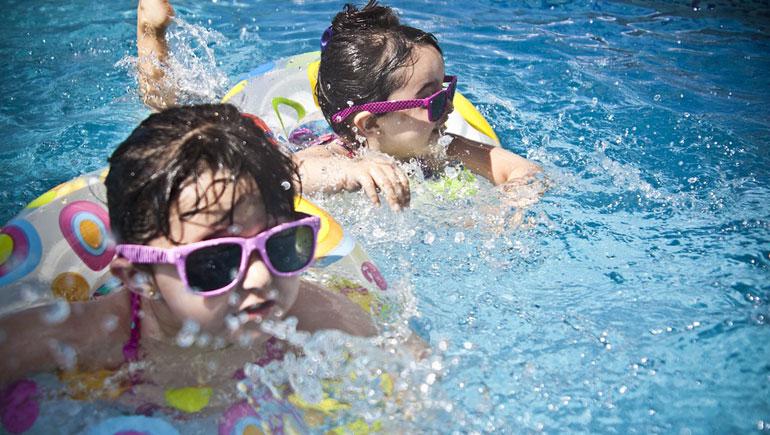 kids playing in a pool